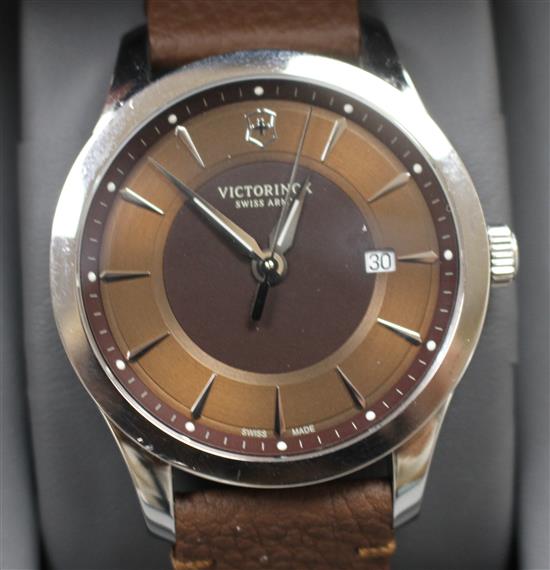 A gentlemans modern stainless steel Victorinox Swiss Army quartz wrist watch, with baton numerals and date aperture